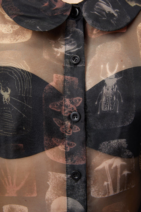 Blouse gothique transparente à épaules bouffantes et épaules dénudées.-1