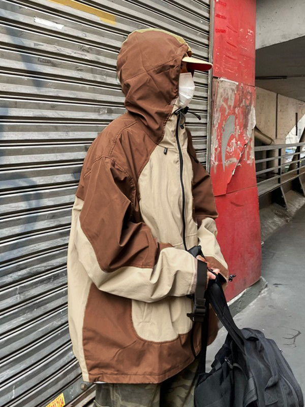 Chaqueta extragrande con capucha y cierre de bloque de color bordado-1